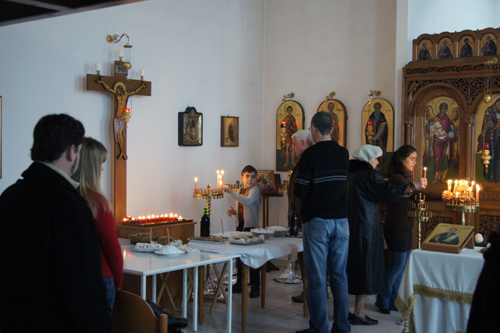 Lighting candles before Mass